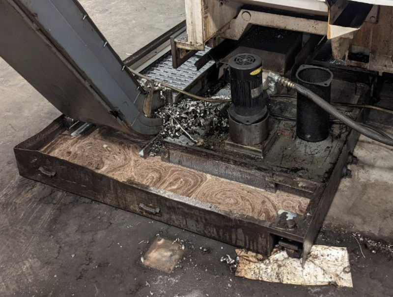 Dirty coolant tank in real shop conditions